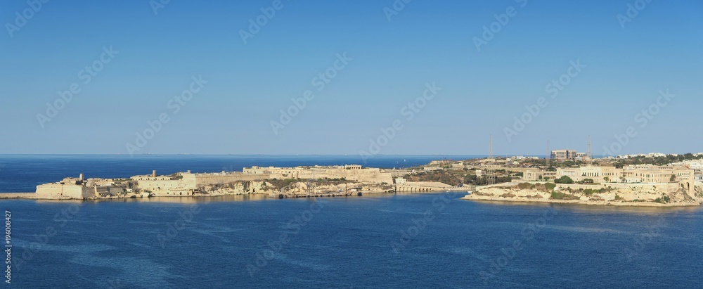 Wide view with the old Fort Ricasoli from Valletta in Malta