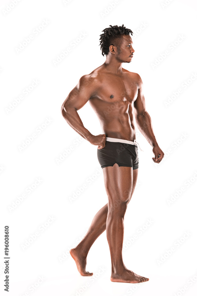Fit young man with beautiful torso isolated on white background Fit young man with beautiful torso isolated on white background