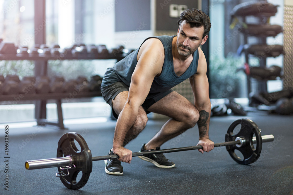 Man exercising in gym
Man exercising in gym