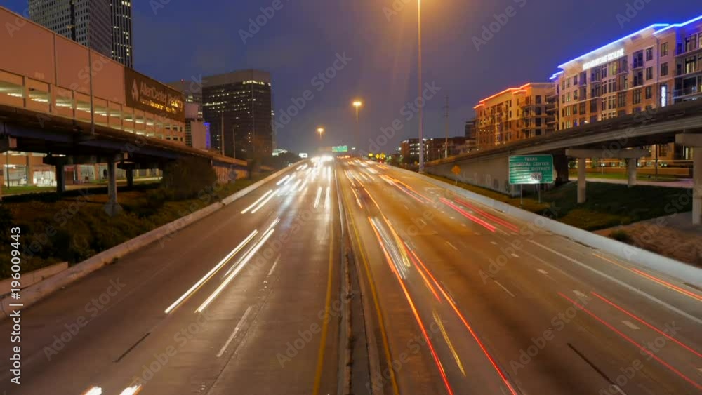 Time lapse of traffic on freeway in Downtown Houston