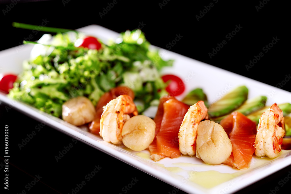 Dish mix of salads with seafood Dish mix of salads with seafood