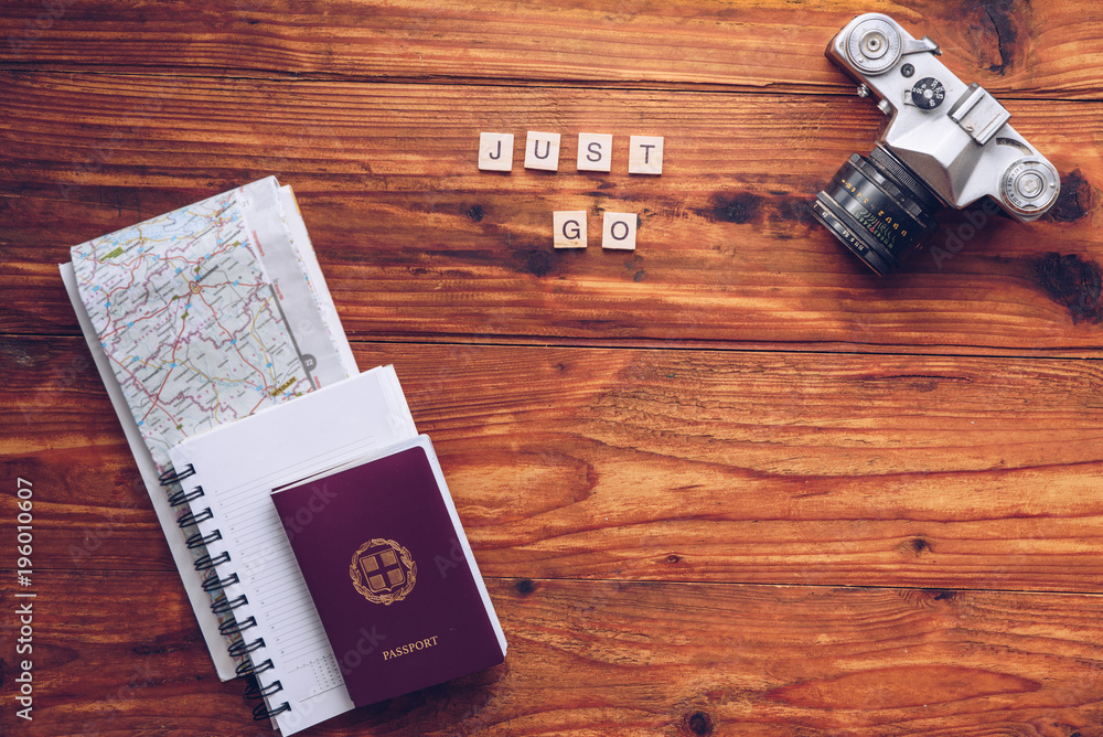 Fototapeta premium Just go words made from wooden letters. Travel concept