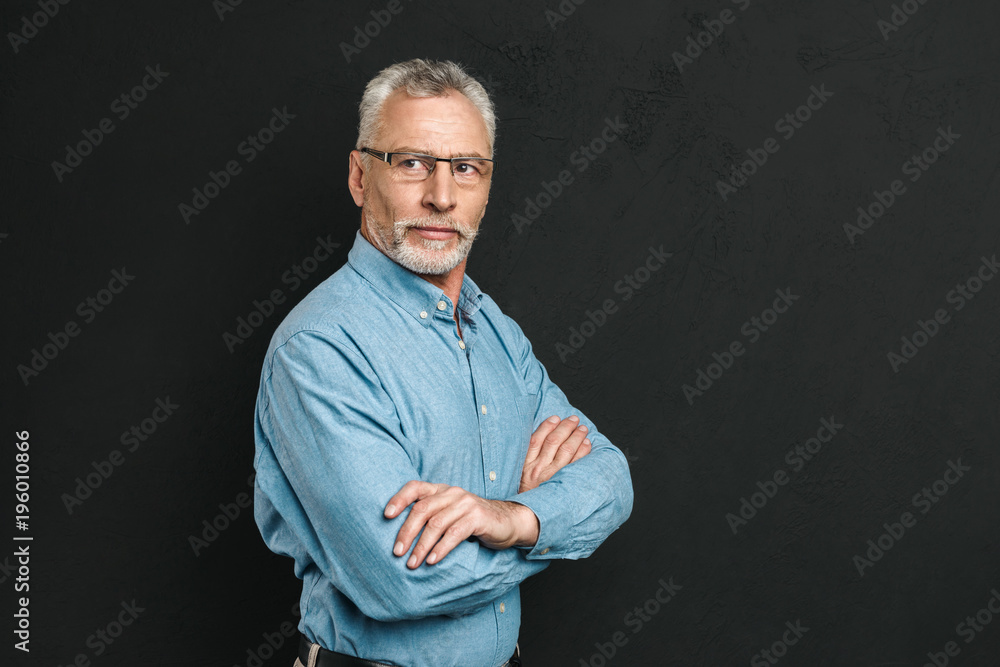 Portrait of a handsome mature man dressed in shirt