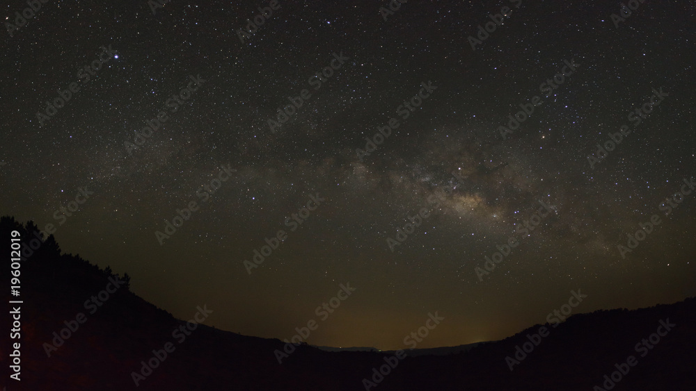 Milky way galaxy with stars and space dust in the universe, Long exposure photograph, with grain. Milky way galaxy with stars and space dust in the universe, Long exposure photograph, with grain.