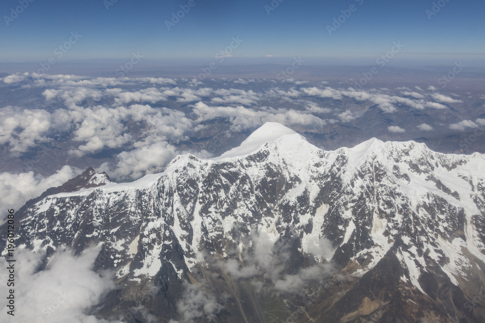 Obraz premium Cerro Tiquimani, Huayna Potosi. The Cordillera Real is a mountain range in the South American Altiplano of Bolivia.