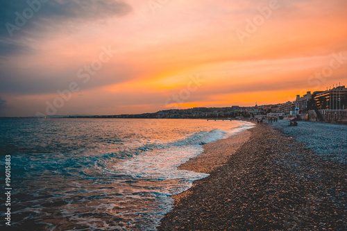 warm colored beach in the afternoon at nice  france