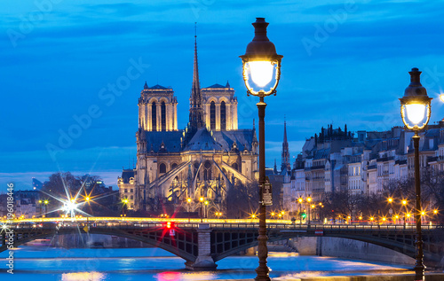 Fotografie, Obraz The Notre Dame Cathedral in the evening , Paris, France.