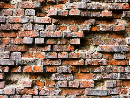 Old broken brick wall