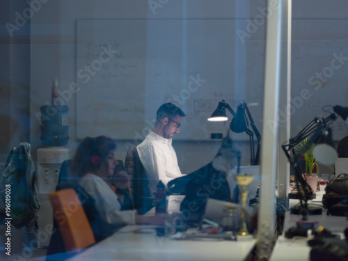 businessman working using a laptop in startup office