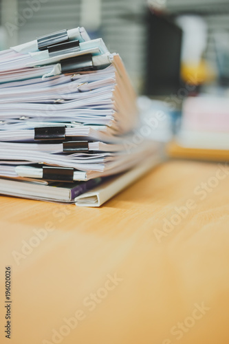 Stack of documents on the desk