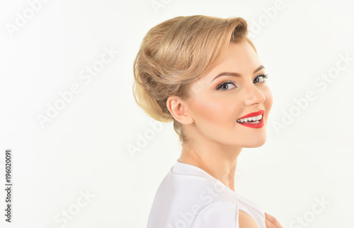 Beautiful spa woman. Perfect fresh skin  red lips  in elegant white dress. Beauty  spa  makeup  cosmetics  face lifting  skincare and haircare concept. Copy space for advertise of your product.