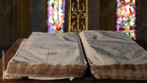 Book of Magic spells cinematic shot. Beautiful ancient grimoire book, with cinematic light