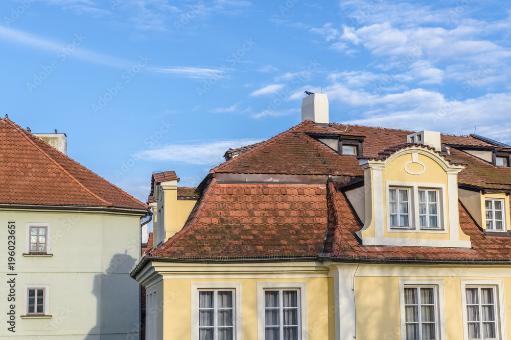 Roofs of old Prague and the blue sky