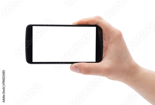 A man hand holding smart phone making photo isolated on white background.