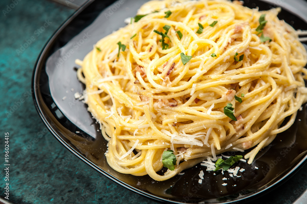 Spaghetti carbonara with egg and pancetta