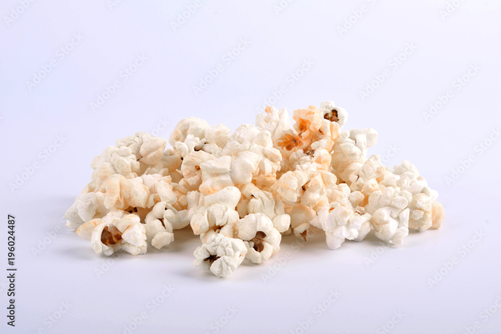 a bunch of popcorn on a gray background a bunch of popcorn on a gray background