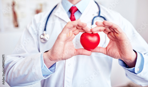 Doctor in front of a bright background, large copy-space