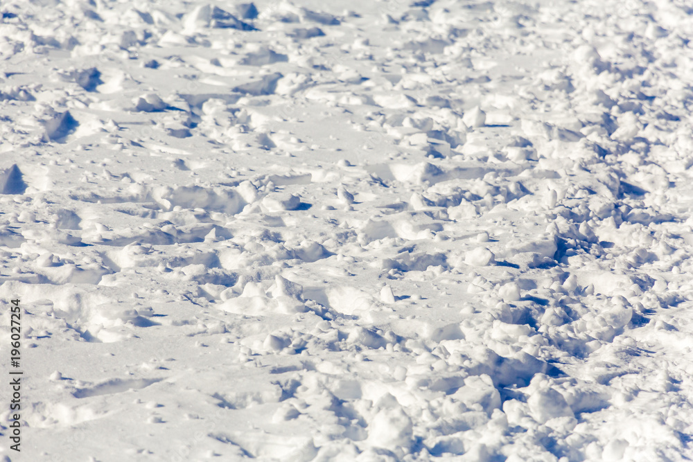 Footprints in the snow. Sunny winter's day. Drift.