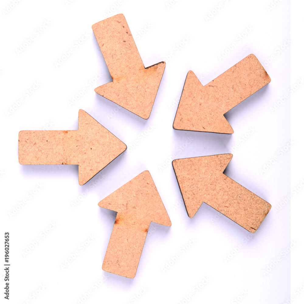 Wooden arrows in different directions are isolated on a white background Wooden arrows in different directions are isolated on a white background