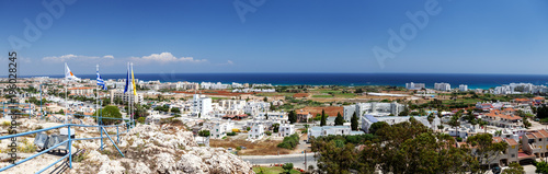 Cyprus. panorama of Protaras town. Mediterranean sea. flags of the island of Cyprus