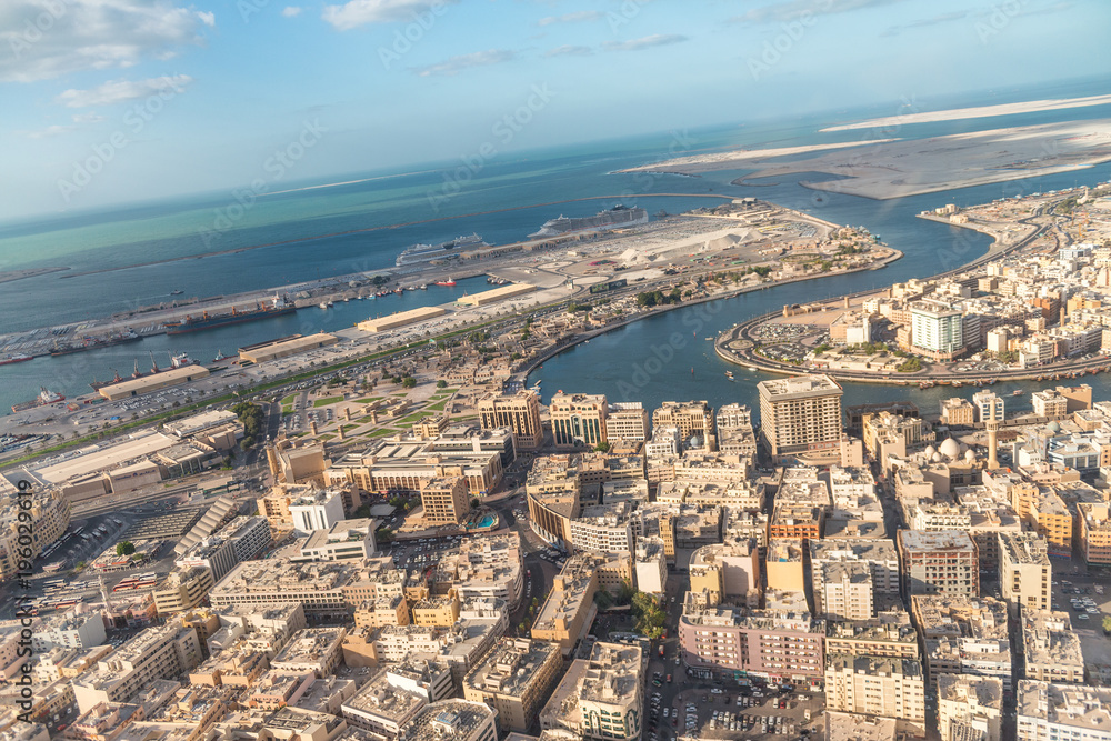 Fototapeta premium Aerial view of Dubai skyline and creek, UAE