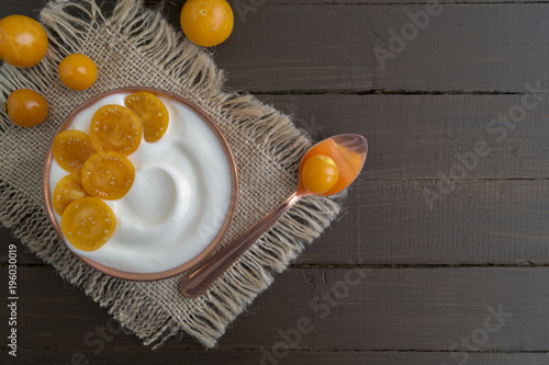 Natural healthy yogurt with muesli and fruit. photo