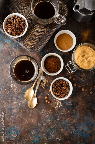 Coffee with coffee beans, ground coffee and brown sugar