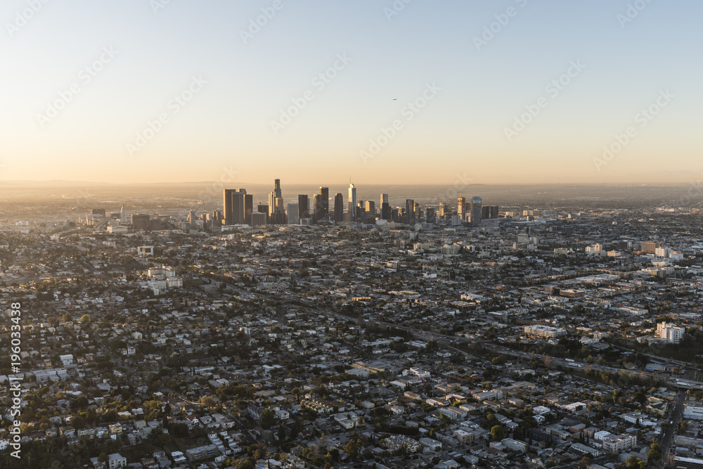 Obraz premium Early morning aerial view of buildings and streets near urban downtown Los Angeles, California.