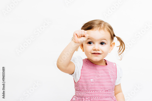 Preschool toddler girl with ponytails
