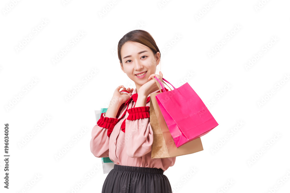 A girl with shopping bags. Shopping woman smiling. Isolated over white background. A girl with shopping bags. Shopping woman smiling. Isolated over white background.