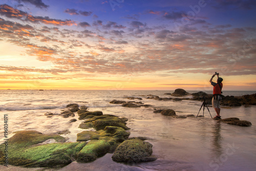 sunset seascape with natural coastal rocks. nature composition