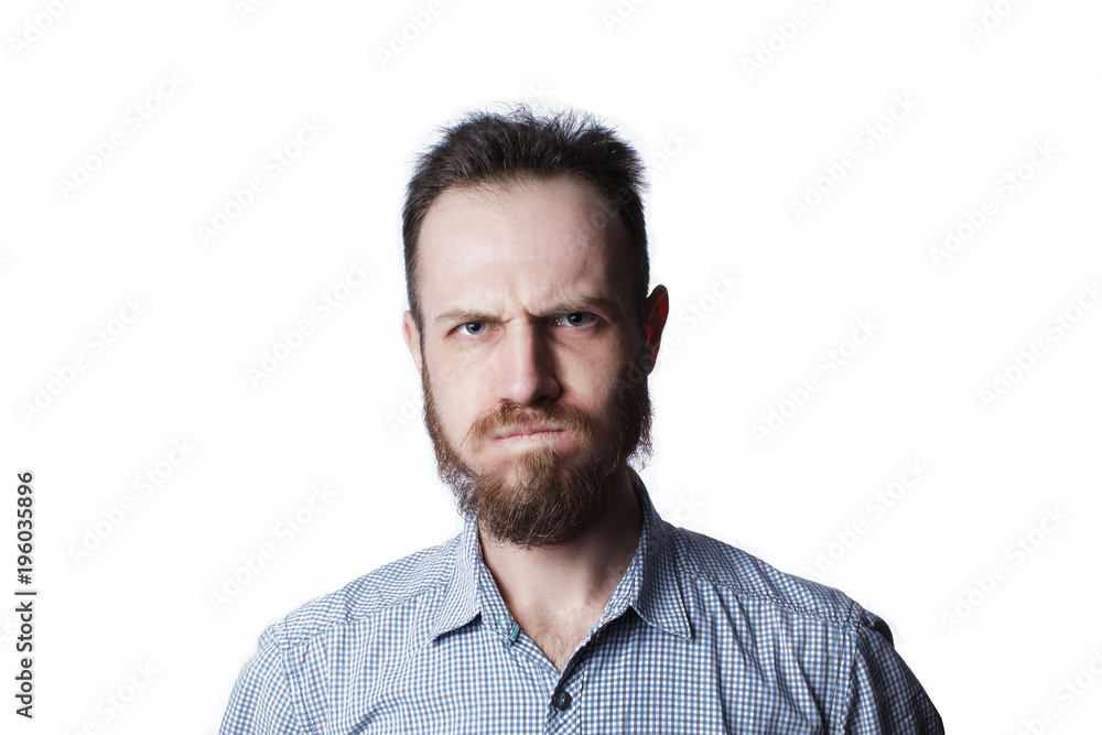 Face of an angry and furious male on a white background.