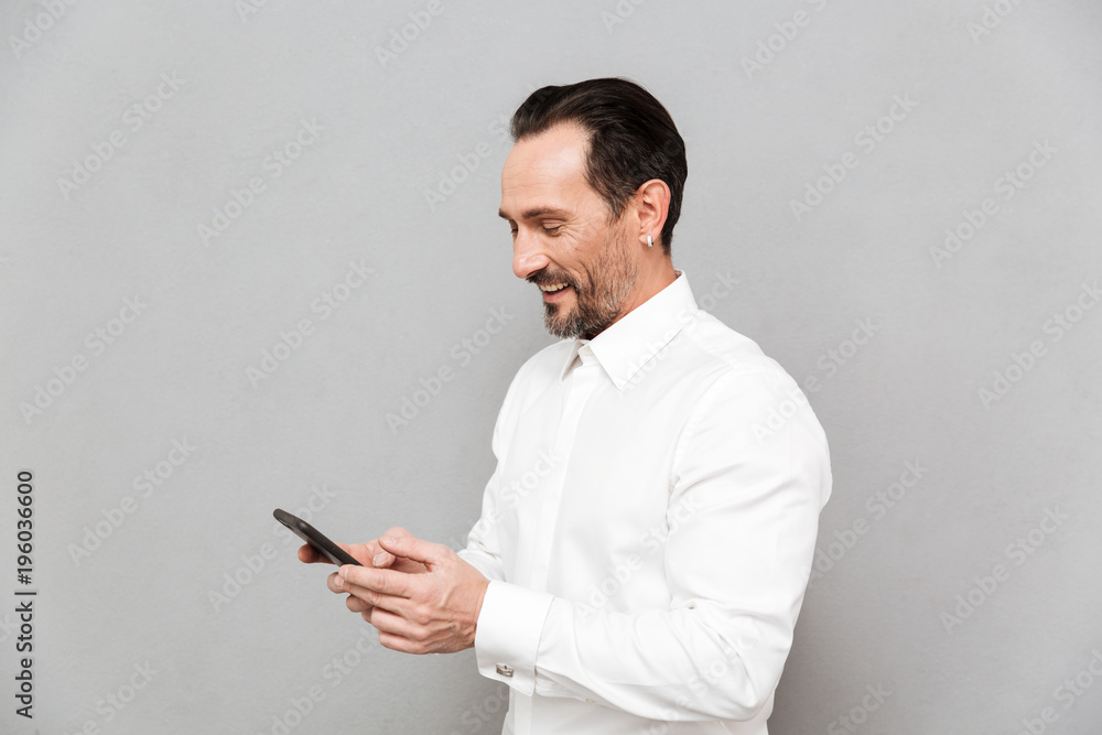 Portrait of a smiling mature man dressed in shirt Portrait of a smiling mature man dressed in shirt