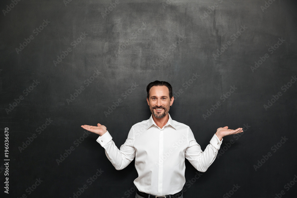 Portrait of a confident mature man dressed in shirt Portrait of a confident mature man dressed in shirt