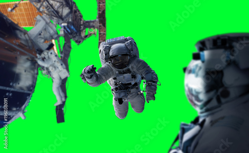 Fototapeta Naklejka Na Ścianę i Meble -  Astronaut working on a space station 3D rendering elements of this image furnished by NASA