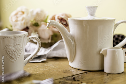 drop of tea coffee from a tea pot 