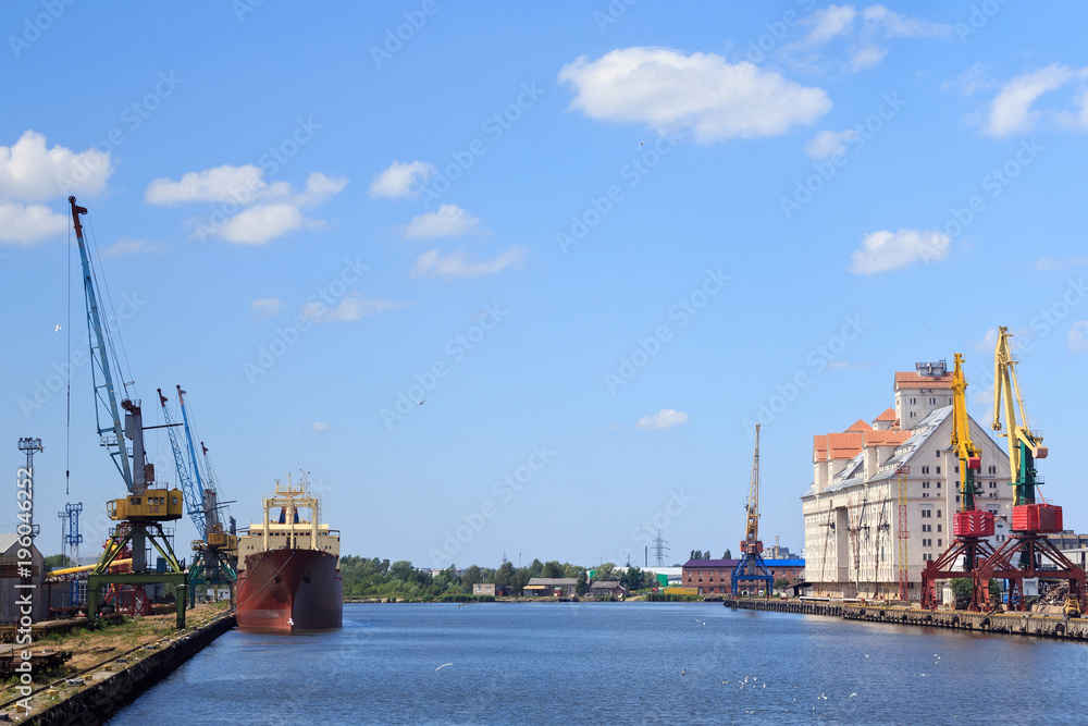 Heavy harbour jib cranes in the Kaliningrad Sea Fishing Port.