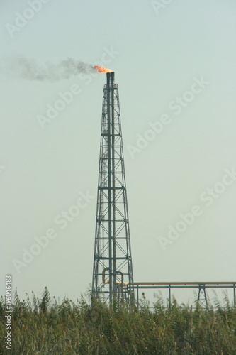 A gas flare, alternatively known as a flare stack photo
