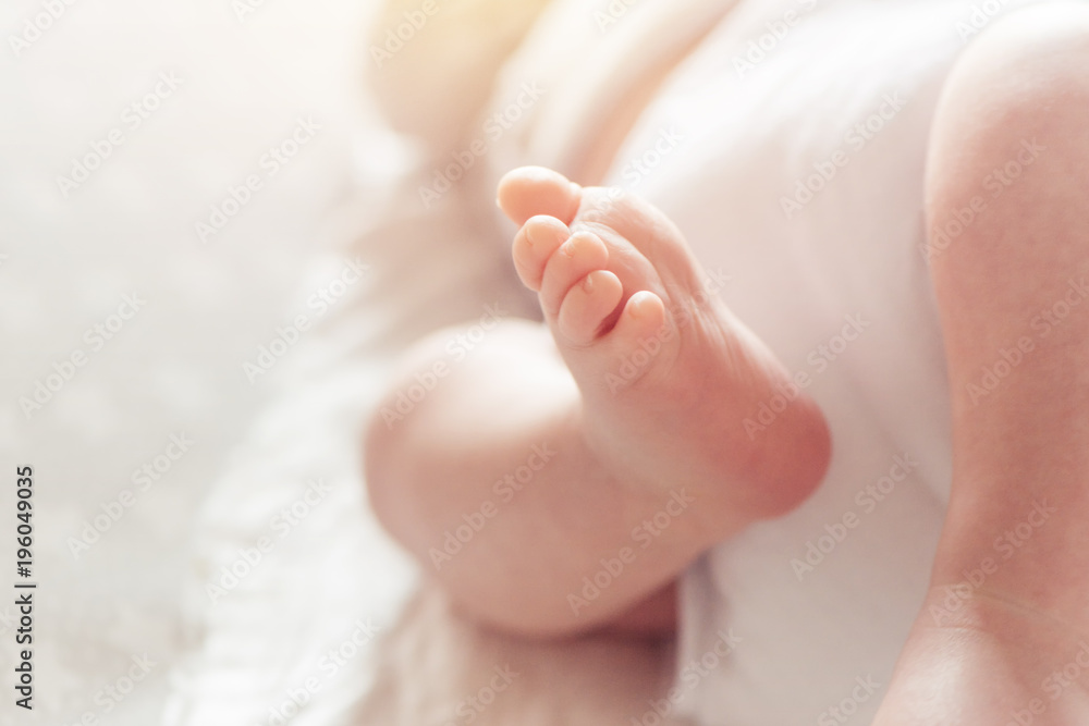 Close up of one month old baby boy foot Close up of one month old baby boy foot
