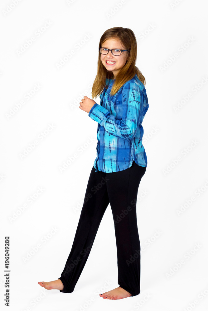 Smiling Young Girl Walking On White Background Smiling Young Girl Walking On White Background