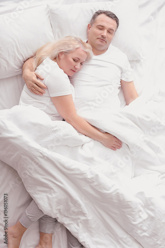 Senior couple in bed togeth...