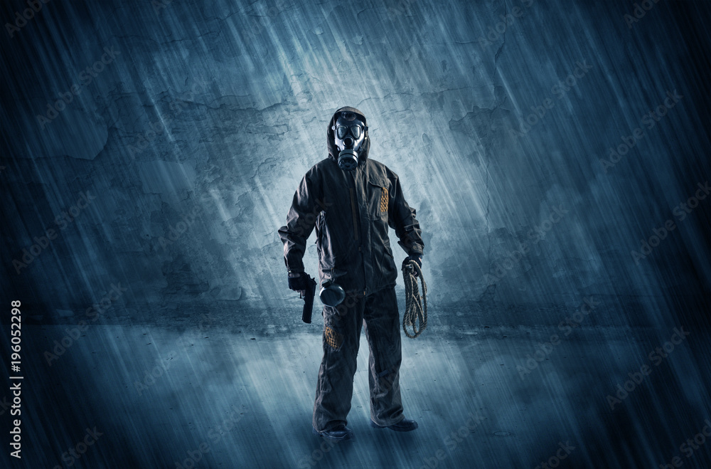 Peril man in front of a crumbly wall