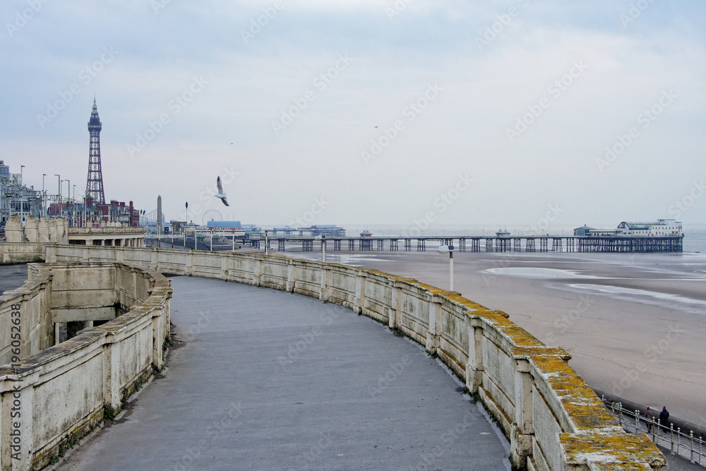 Winter view of the Blackpool coast with promenade, pier and tower.