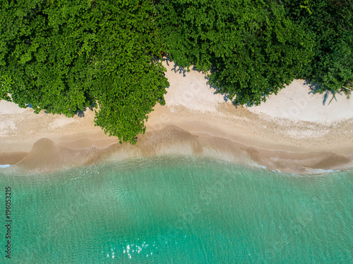 Sea Aerial view, Top view,amazing nature background.The color of the water and beautifully bright.Azure beach with rocky mountains and clear water of Thailand ocean at sunny day.flying drone,sea view