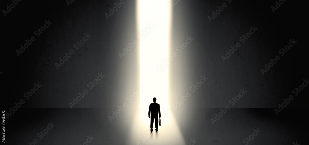 Businessman seeing the light at the end of something Businessman seeing the light at the end of something