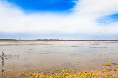  Beautiful winter landscape in countryside, lake surface in nature park Lonjsko polje, Croatia 