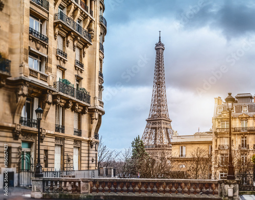 The eiffel tower in Paris from a tiny street