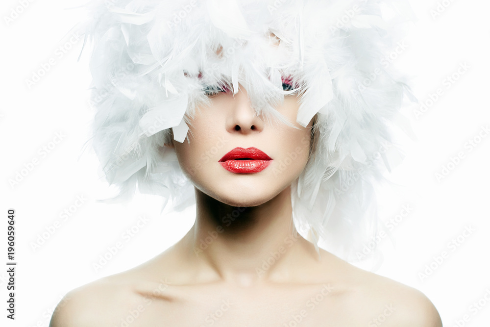 Beautiful Girl in white feathers Hat. Make-up
