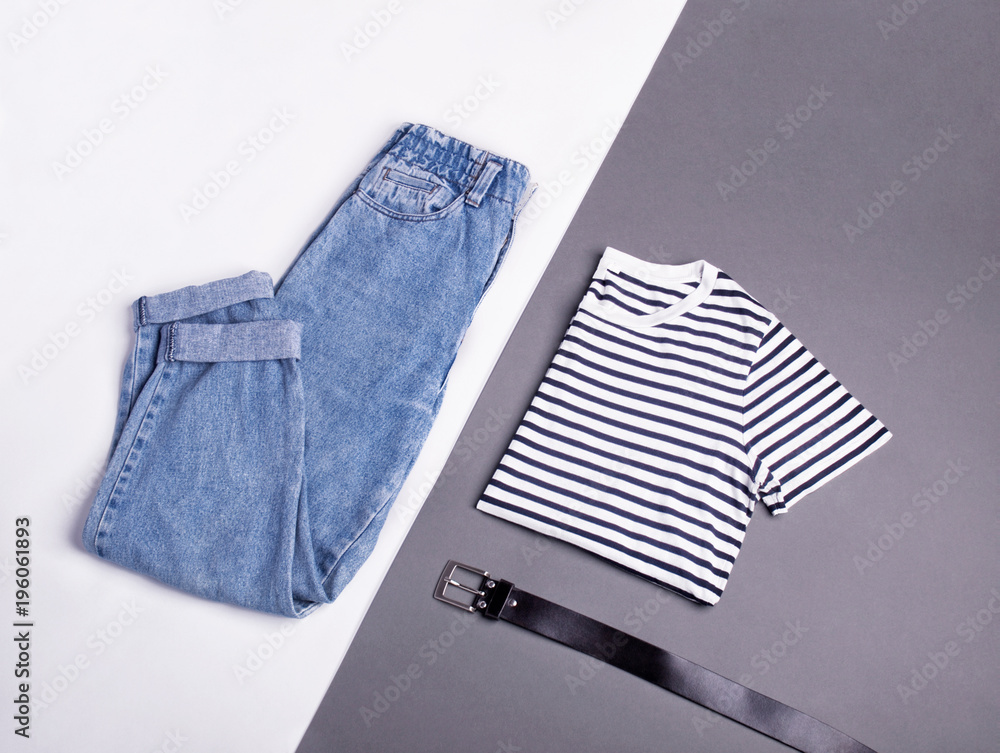 directory Concurrenten Prestige Simple casual outfit with white striped t-shirt, vintage high waisted mom  jeans and black belt isolated on gray and white background. Flat lay. Copy  space Stock Photo | Adobe Stock
