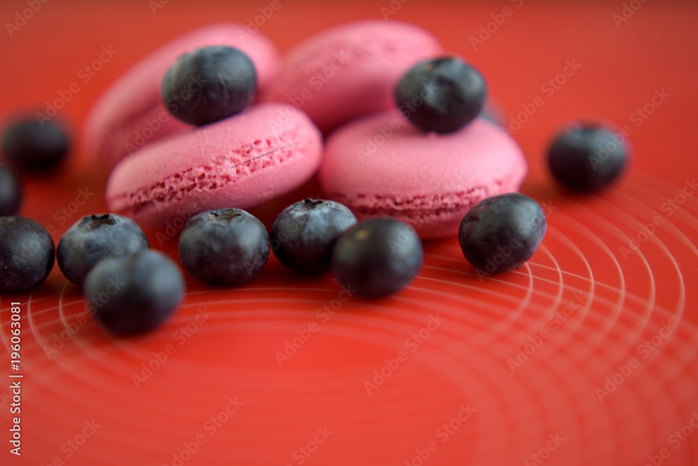 pink macaroon cookies with blueberry berries pink macaroon cookies with blueberry berries